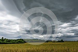 panorama of black sky background with storm clouds. thunder front