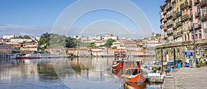 Panorama of boats at the Ribeira quay in Porto