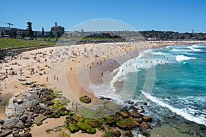 Panorama of Bondi beach on a hot sunny summer day with blue sky in Sydney Australia