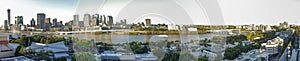 Panorama of Brisbane city CBD surrounded by waters of Brisbane river