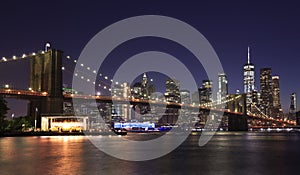 Panorama of Brooklyn Bridge and New York City at dusk