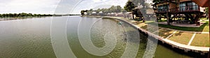 Panorama of Bung Chawak Resort lake and tree Houses