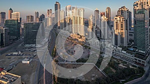 Panorama of Business bay Dubai night to day aerial timelapse.