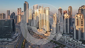 Panorama of Business bay Dubai night to day aerial timelapse.