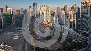 Panorama of Business bay Dubai night to day aerial timelapse.