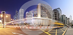 Panorama of a busy road in Hong Kong from day to