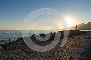 Panorama of Camogli, pier and lighthouse - Liguria - Italy