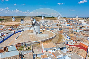 Panorama of Campo de Criptana dotted with white windmills, Spain