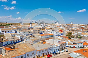 Panorama of Campo de Criptana dotted with white windmills, Spain