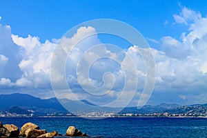 Panorama of Cannes in France with marina, cruise ships, palace of festivals, Croisette, city and highland