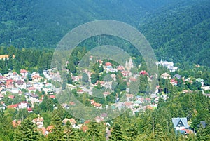 Panorama of Carpathian mountains scenery, fir forest, Sinaia tow