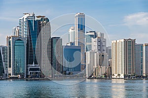 Panorama of the center of the Emirate of Sharjah, United Arab Emirates . Corniche area of Sharjah, UAE city