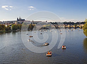 Panorama of Charles bridge over Vltava river and Gradchany, Prague Castle and St. Vitus Cathedral. Czech Republic, , golden hour l