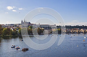 Panorama of Charles bridge over Vltava river and Gradchany, Prague Castle and St. Vitus Cathedral. Czech Republic, , golden hour l