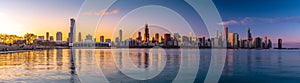 Panorama Chicago downtown skyline sunset Lake Michigan with most Iconic building from Adler Planetarium, Illinois photo