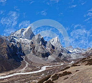 Cholatse and Taboche mountain in Nepal Himalaya photo