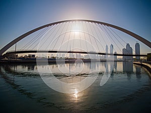 Panorama of the city early in the morning at dawn with a bridge over the city channel Dubai Greek. photo