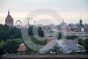 Panorama of the city of Gdansk. Port cranes on the background of city panorama.