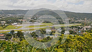 Panorama of the city of Legazpi on the background of the airport. Luzon, Philippines.