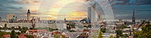 Panorama of the city of Leipzig, Saxony, with tall buildings, town hall and churches with an interesting colored sky