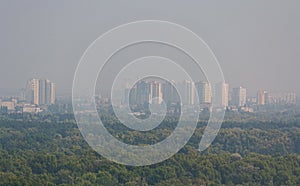 Panorama of the city are shrouded in thick smoke from burning peat bogs. Kiev photo