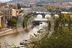 A panorama of the city with a view of the Vltava River and four