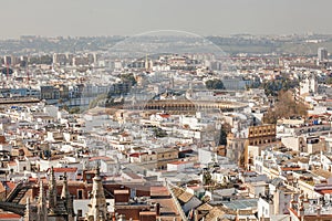 Panorama cityscape aerial view of Seville Spain. Arena of bullfighting in Seville