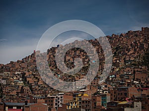 Panorama cityscape landscape of La Paz unfinished brick houses slum poverty buildings urban city Bolivia South America