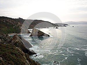 Panorama of cliff coast at El Banco mas bonito del mundo The best bank of the world Loiba bench Ortigueira Galicia Spain