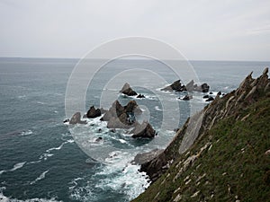Panorama of cliff coast at El Banco mas bonito del mundo The best bank of the world Loiba bench Ortigueira Galicia Spain