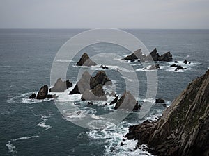 Panorama of cliff coast at El Banco mas bonito del mundo The best bank of the world Loiba bench Ortigueira Galicia Spain