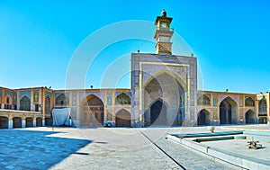Panorama with clock tower portal of Seyed Mosque, Isfahan, Iran