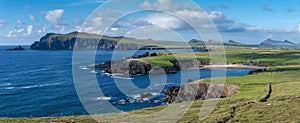 Panorama coastal landscape of the northern Dingle Peninsula with a view of Clogher Beach and the Dunurlin headland