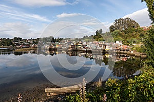 A panorama of the colorful stilt houses of Castro on Chiloe, also known as palafitos.