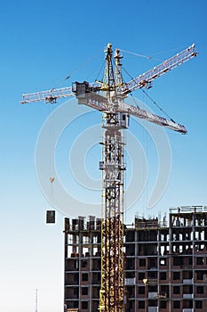 Panorama of construction at the background of blue sky