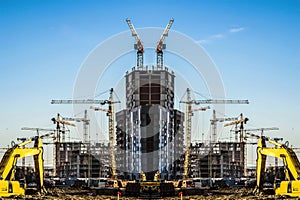 Panorama of construction at the background of blue sky