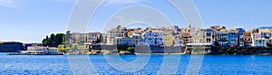 Panorama of Corfu town from the sea. Old town buildings photo