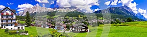 Panorama of Cortina d`Ampezzo- breathtaking mountain village and popular tourist resort in Dolomites Alps, Italy photo