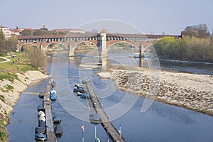 Panorama of covered bridge over the Ticino river in Pavia