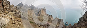 Panorama of Dead city, Khoba-Tele Ridge and Golden Gate rock in the Black sea. Karadag Reserve in spring. Crimea