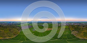 360 panorama by 180 degrees angle seamless panorama view of aerial top view of Paddy rice, agricultural fields in countryside or