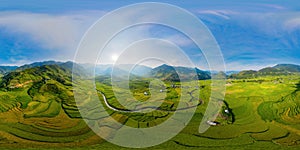 360 panorama by 180 degrees angle seamless panorama view of paddy rice terraces, green agricultural fields in rural area of Mu