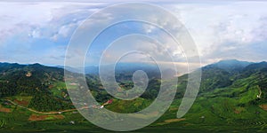 360 panorama by 180 degrees angle seamless panorama view of paddy rice terraces, green agricultural fields in rural area of Mu