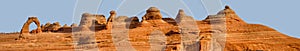 Panorama of Delicate Arch and tourists