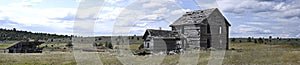 Panorama of Derelict Homestead and Horse Barn photo