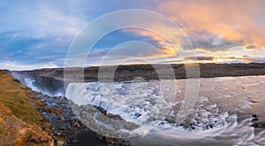 Panorama of Dettifoss waterfall during a colorful sunrise