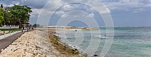 Panorama of a dike along the beach of Seminyak on Bali