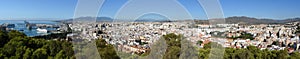Panorama of the dock with cruise liners  and  town  Malaga in Andalucia.