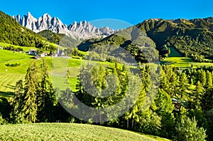 Panorama of the Dolomites with a chruch at Santa Maddalena in Italy