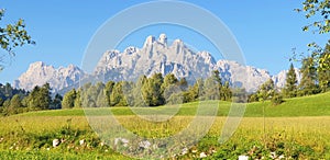 Panorama of the Dolomites mountains on a sunny day, Italy photo